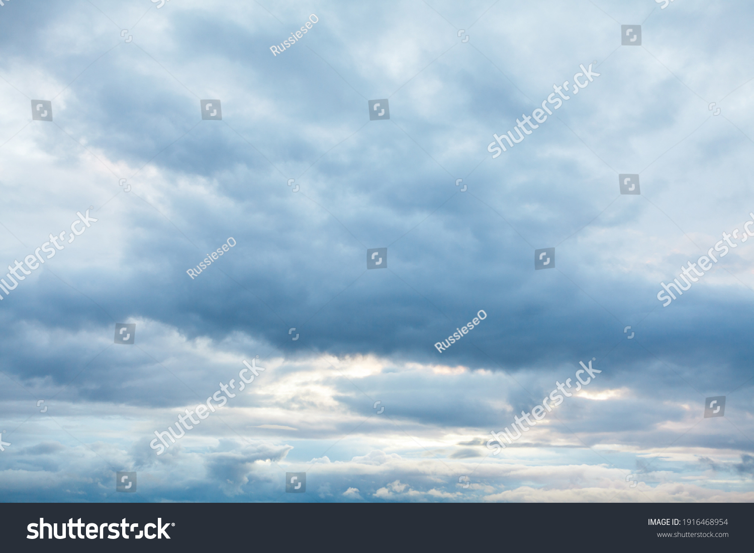 Cloudy sky background . Gloomy weather #1916468954