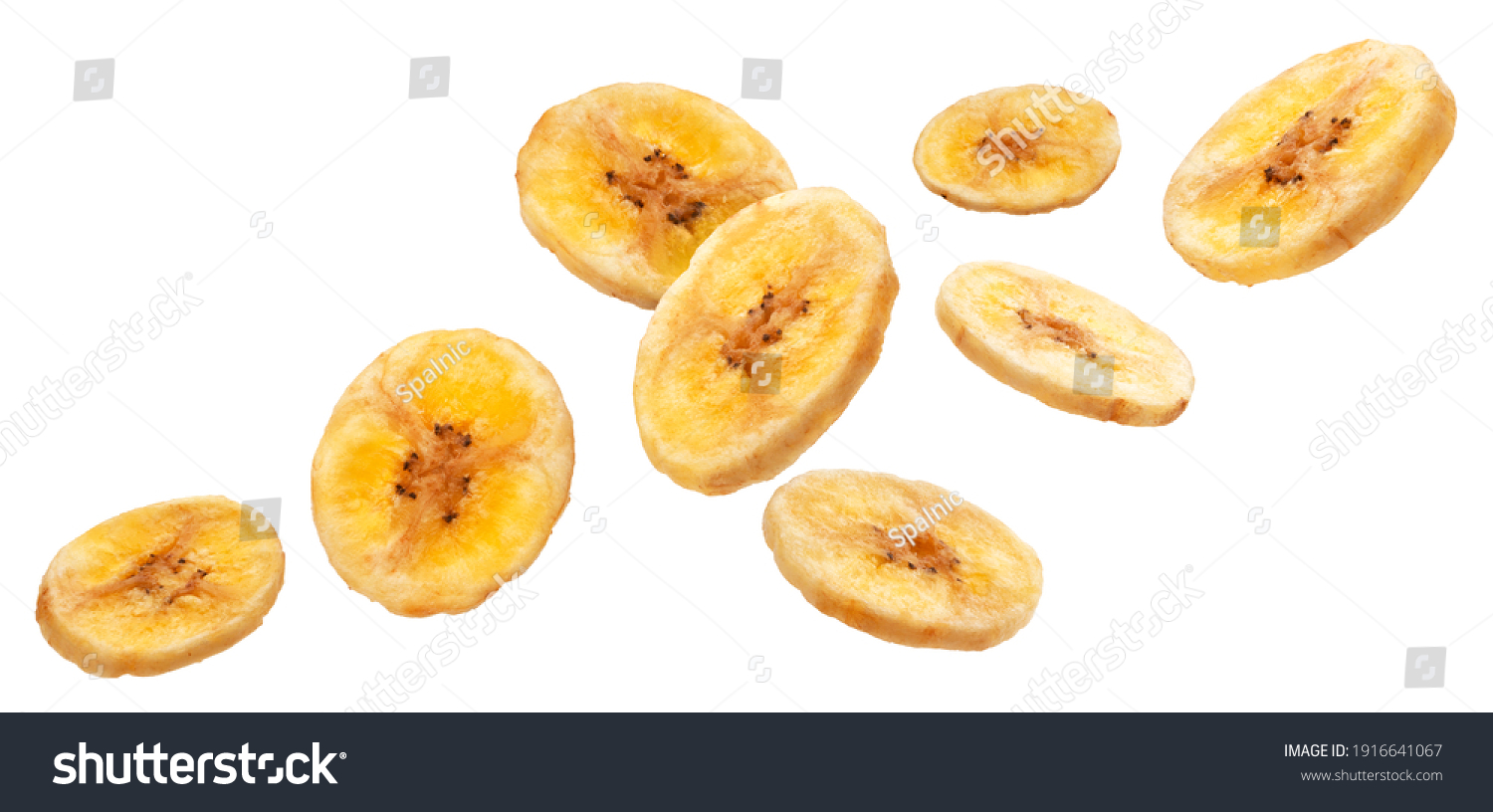 Falling dried banana slices isolated on white background with clipping path #1916641067