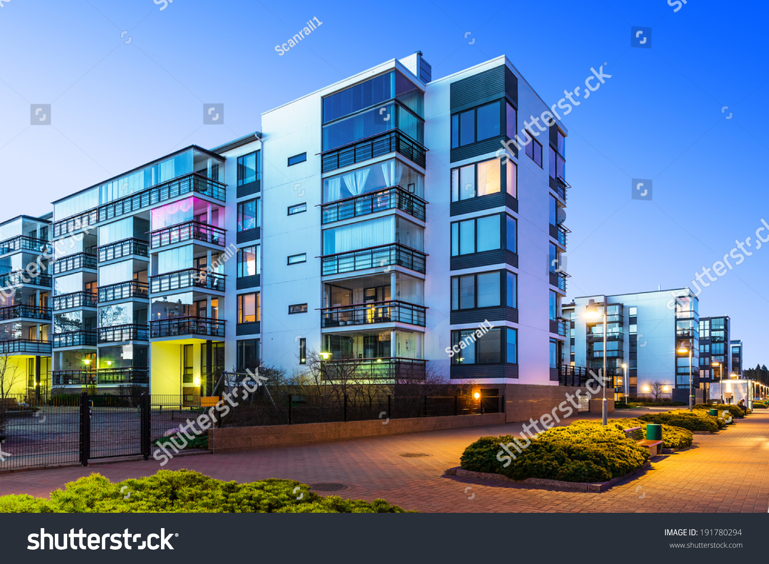 House building and city construction concept: evening outdoor urban view of modern real estate homes #191780294