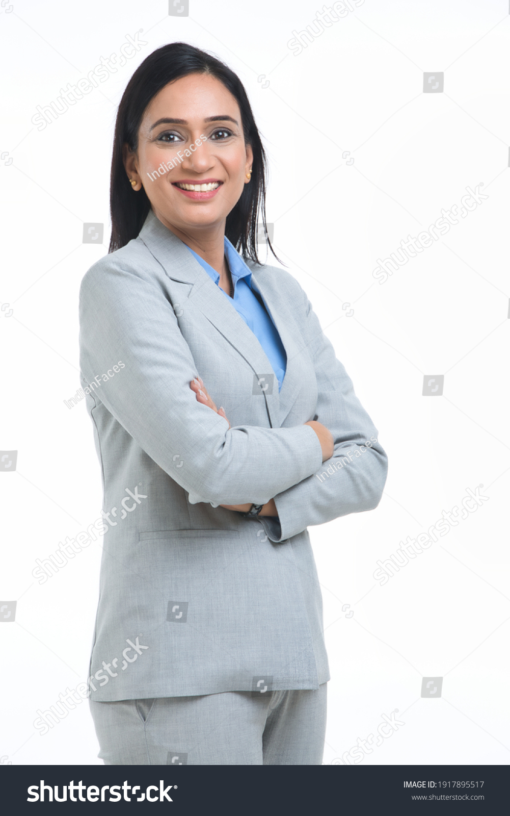 Confident Businesswoman against white background. #1917895517
