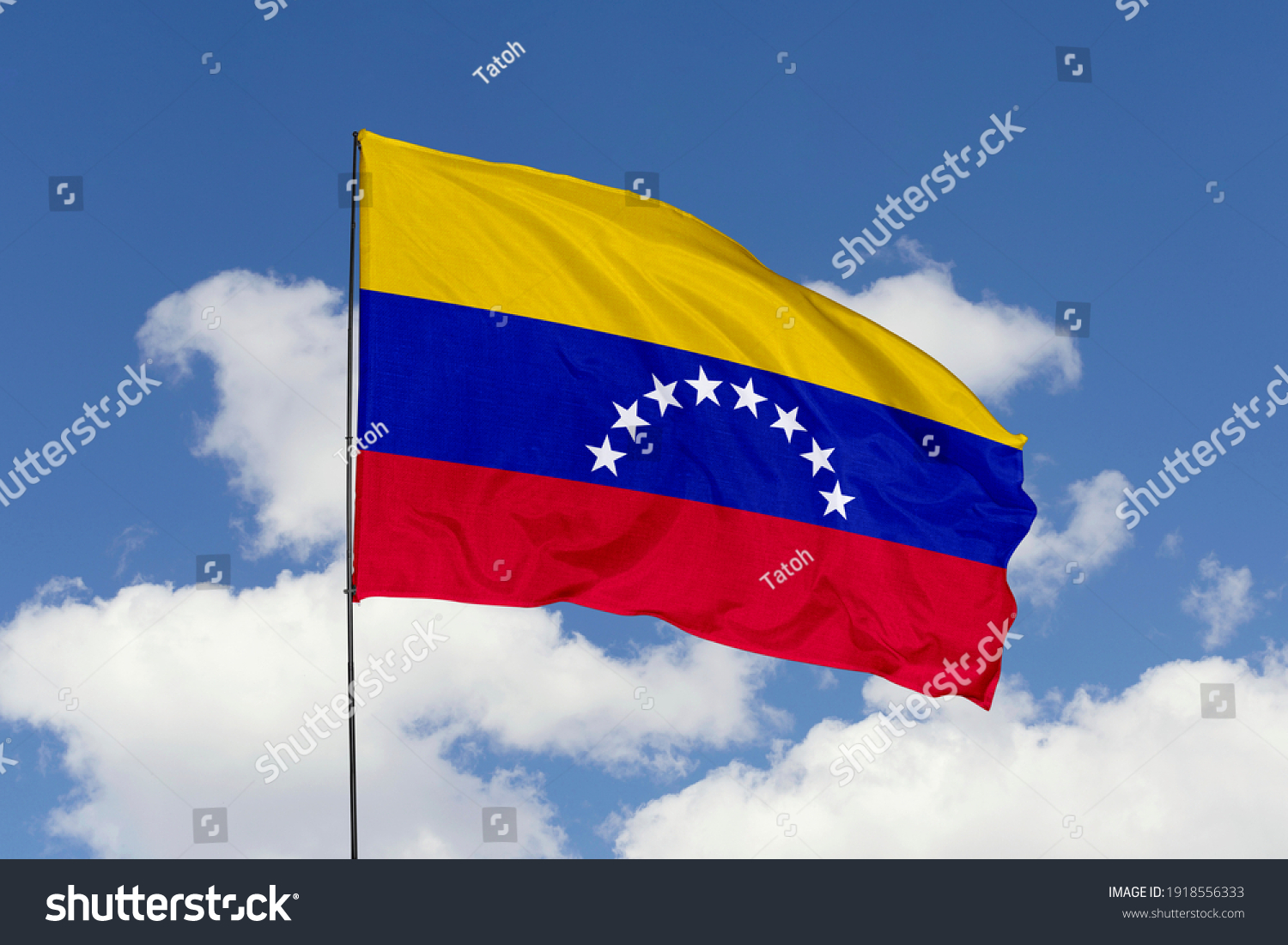 Venezuela flag isolated on the blue sky with clipping path. close up waving flag of Venezuela. flag symbols of Venezuela. #1918556333