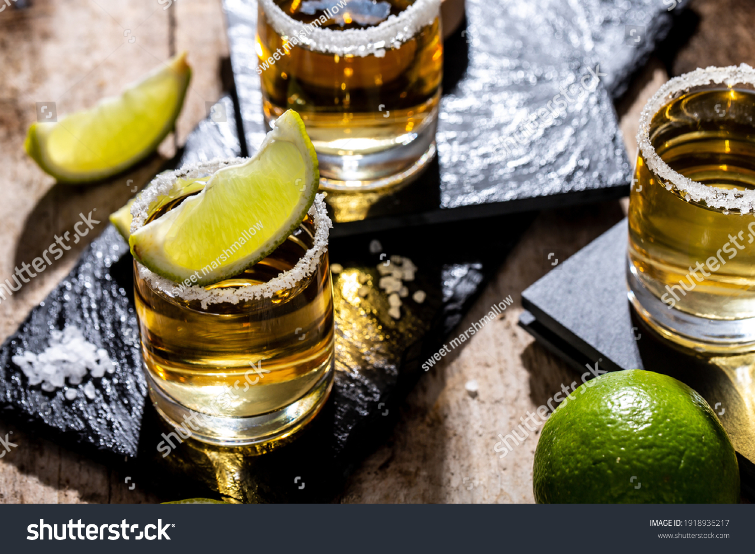 Mexican tequila with lime and salt on black background. space for text. concept luxury drink. Alcoholic drink #1918936217