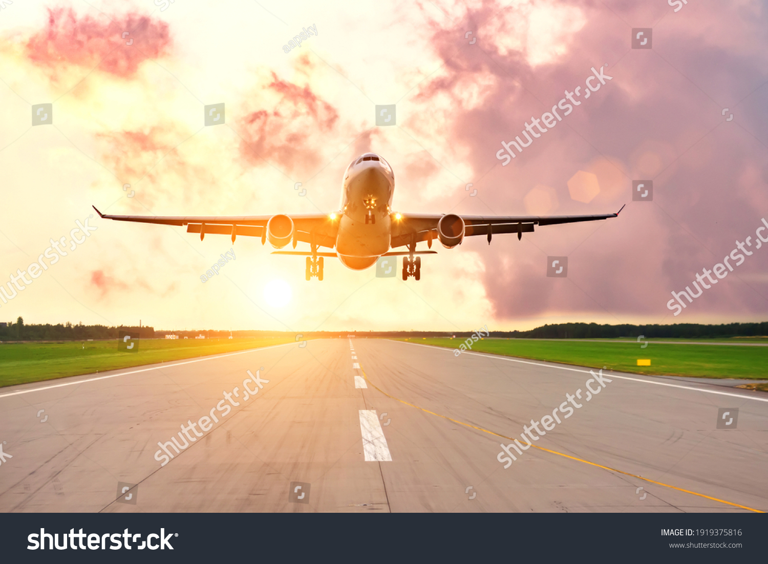 Aeroplane landing at the airport with morning good calm #1919375816