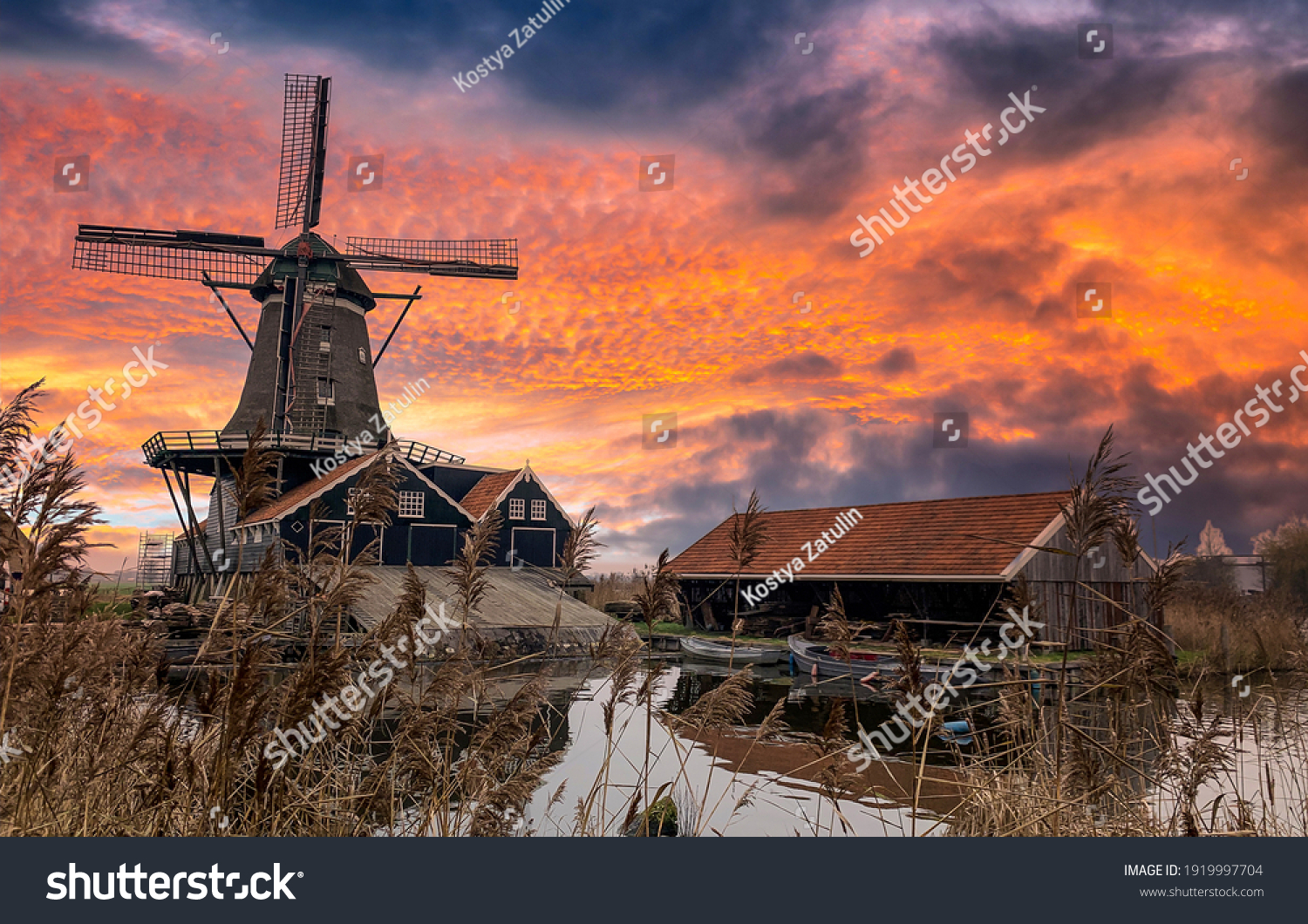 Sunrise over windmill farm in Holland. Windmill at dawn #1919997704