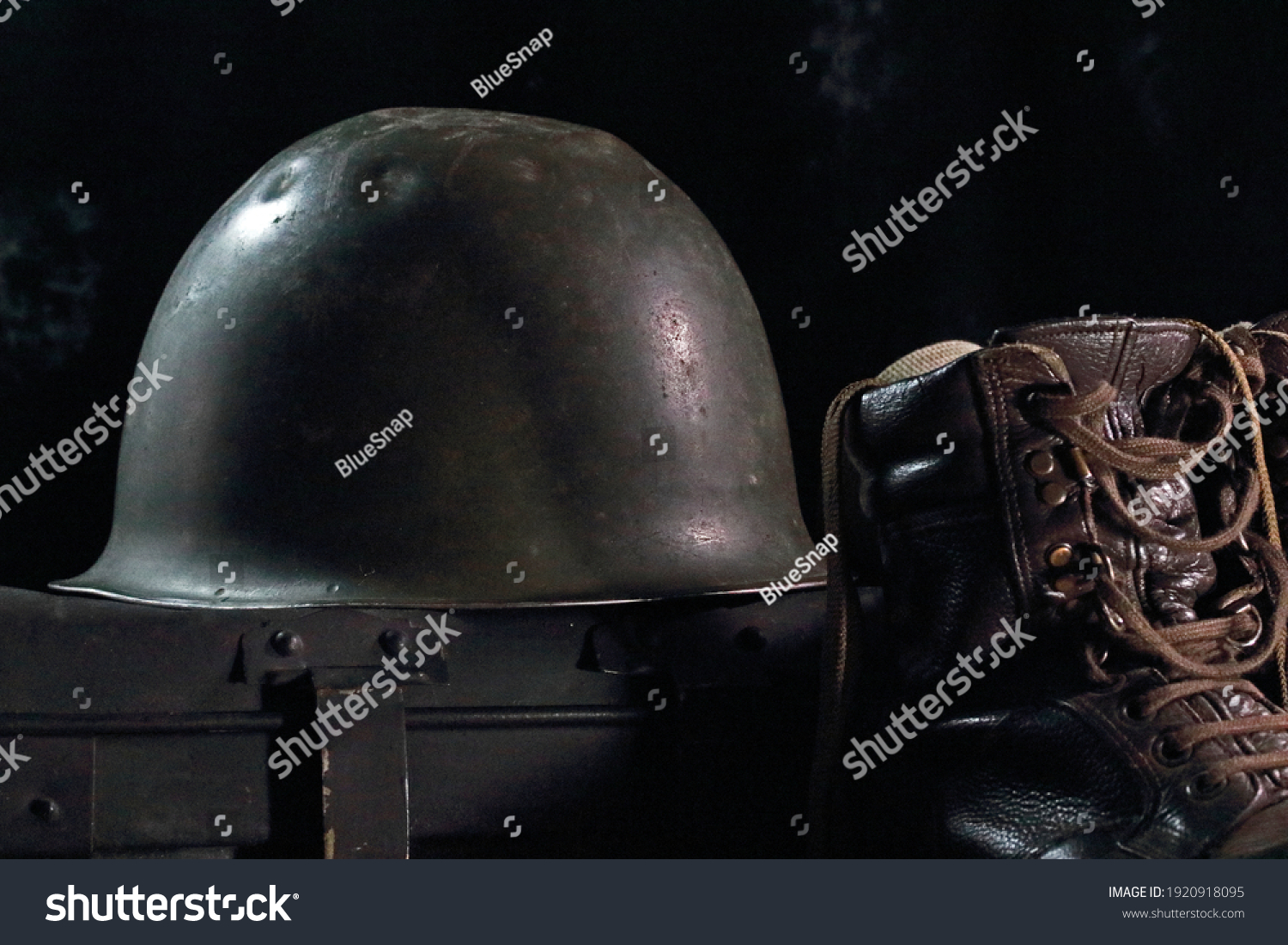 METAL ARMY HELMET WITH AN ARMY COMBAT BOOT AND A METAL TRUNK #1920918095