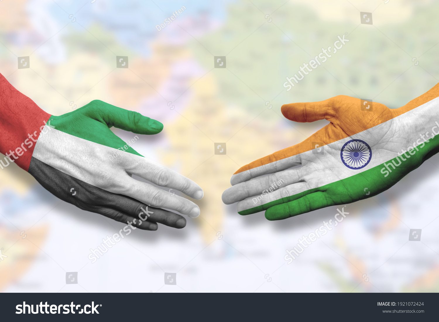 United Arab Emirates and India - Flag handshake symbolizing partnership and cooperation #1921072424