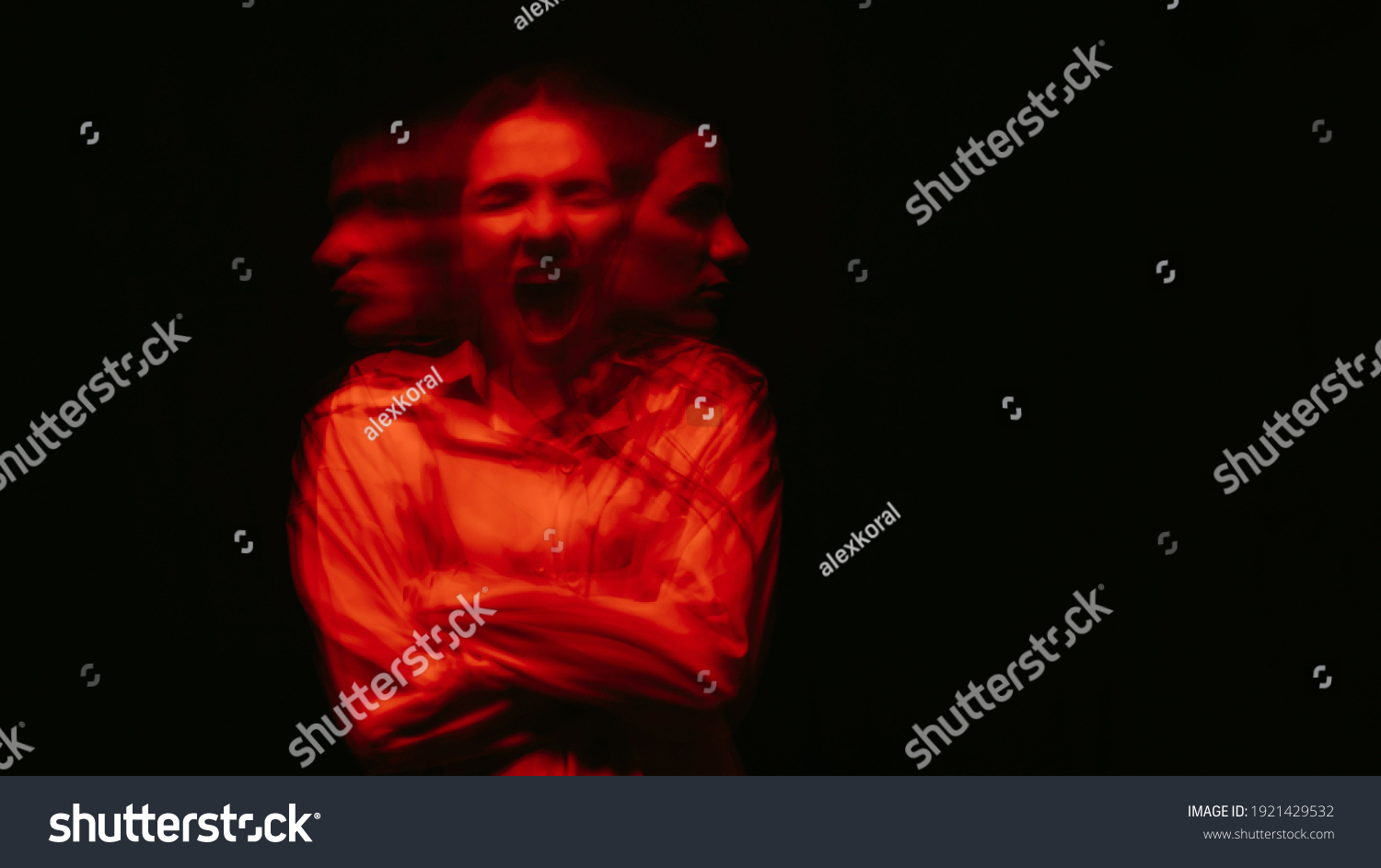 blurry portrait of a schizophrenic woman with paranoid disorders and bipolar disease on a dark background #1921429532