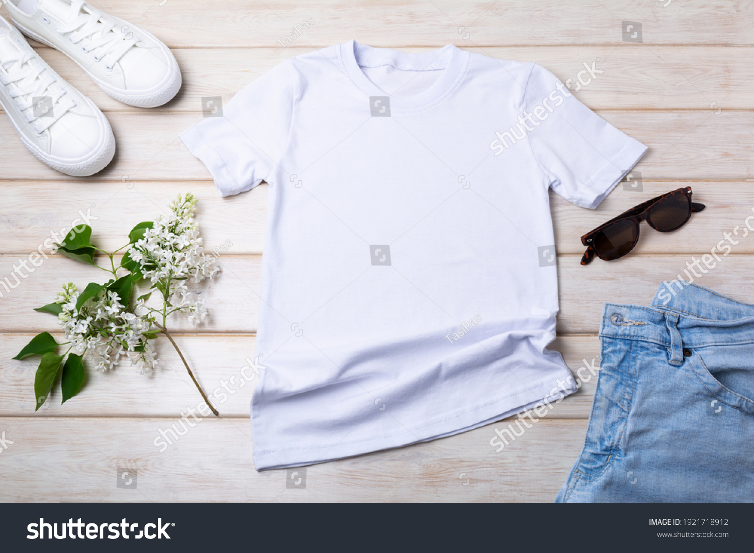 White women’s cotton T-shirt mockup with lilac, blue jeans, sport shoes and sunglasses. Design t shirt template, tee print presentation mock up #1921718912