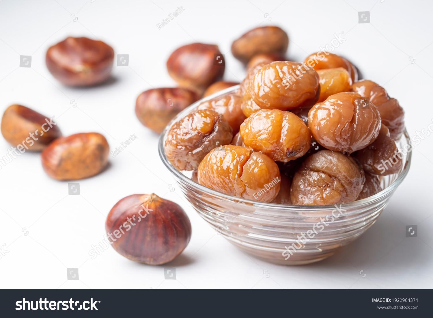 Chestnut dessert and chestnuts on a plate. Traditional delicious Turkish dessert; chestnut candies (Kestane Sekeri) #1922964374