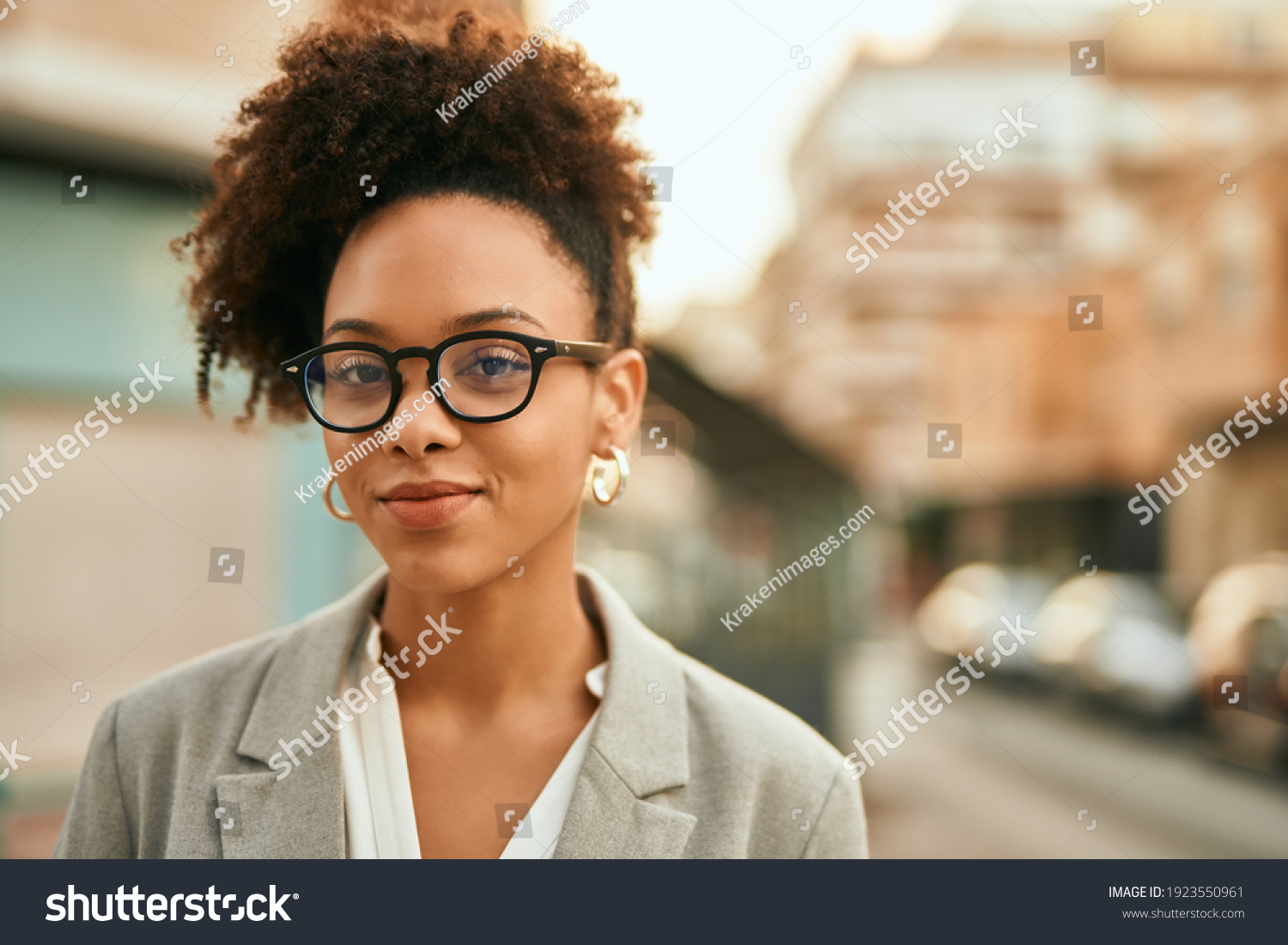 Young african american businesswoman smiling happy standing at the city. #1923550961