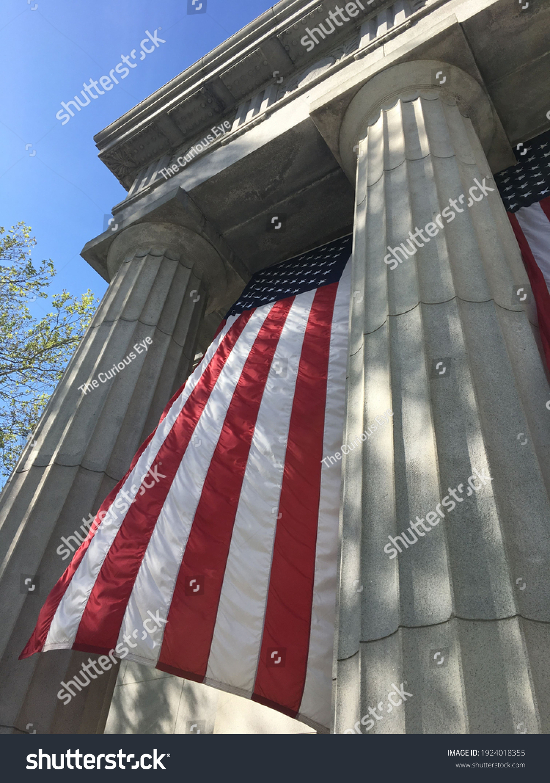 A large American flag hangs in front of General Grant National Memorial aka Grant's Tomb in Morningside Heights, New York City, USA #1924018355