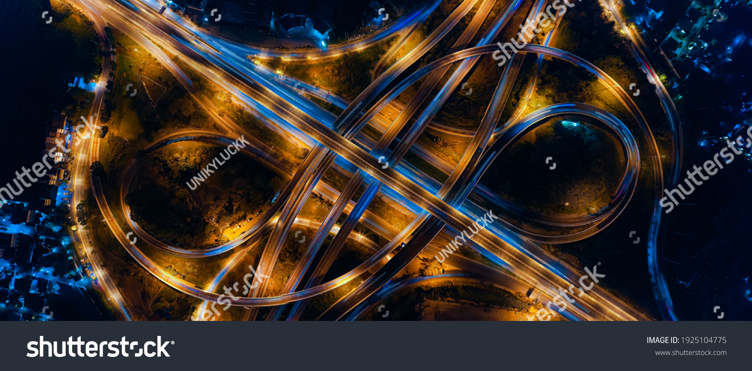 Aerial view of transportation with Expressway, Road and Roundabout, multilevel junction traffic highway-Top view. Important infrastructure and transport in big city, Bangkok Thailand. #1925104775