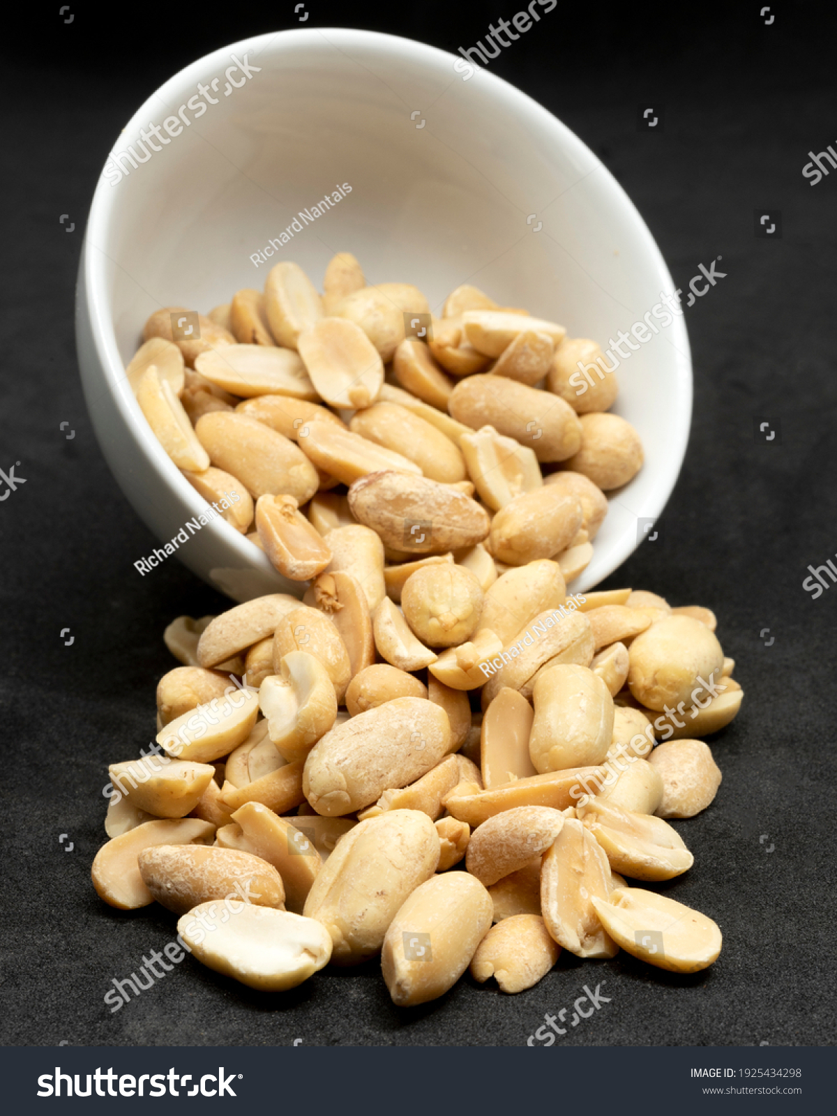 Unsalted peanuts in a withe bowl #1925434298