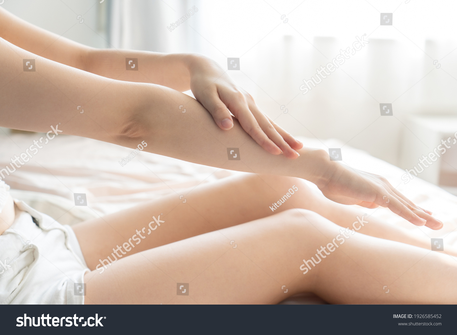 Woman doing skin care in the room #1926585452