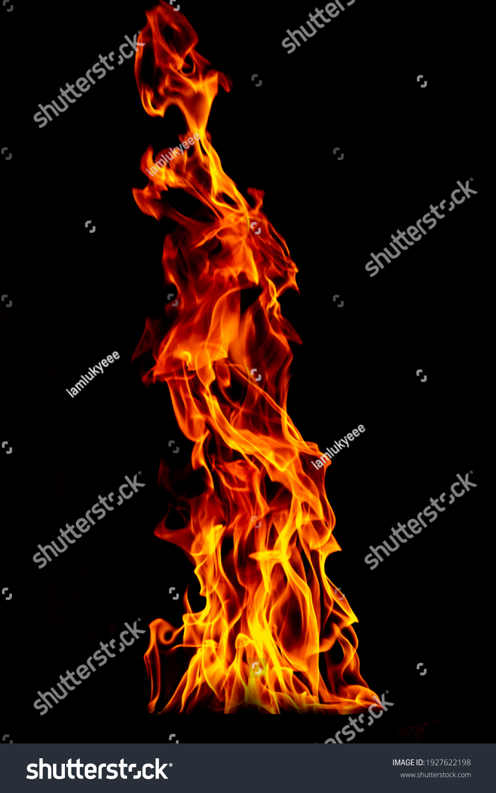 Fire flame isolated on black isolated background - Beautiful yellow, orange and red and red blaze fire flame texture style. #1927622198