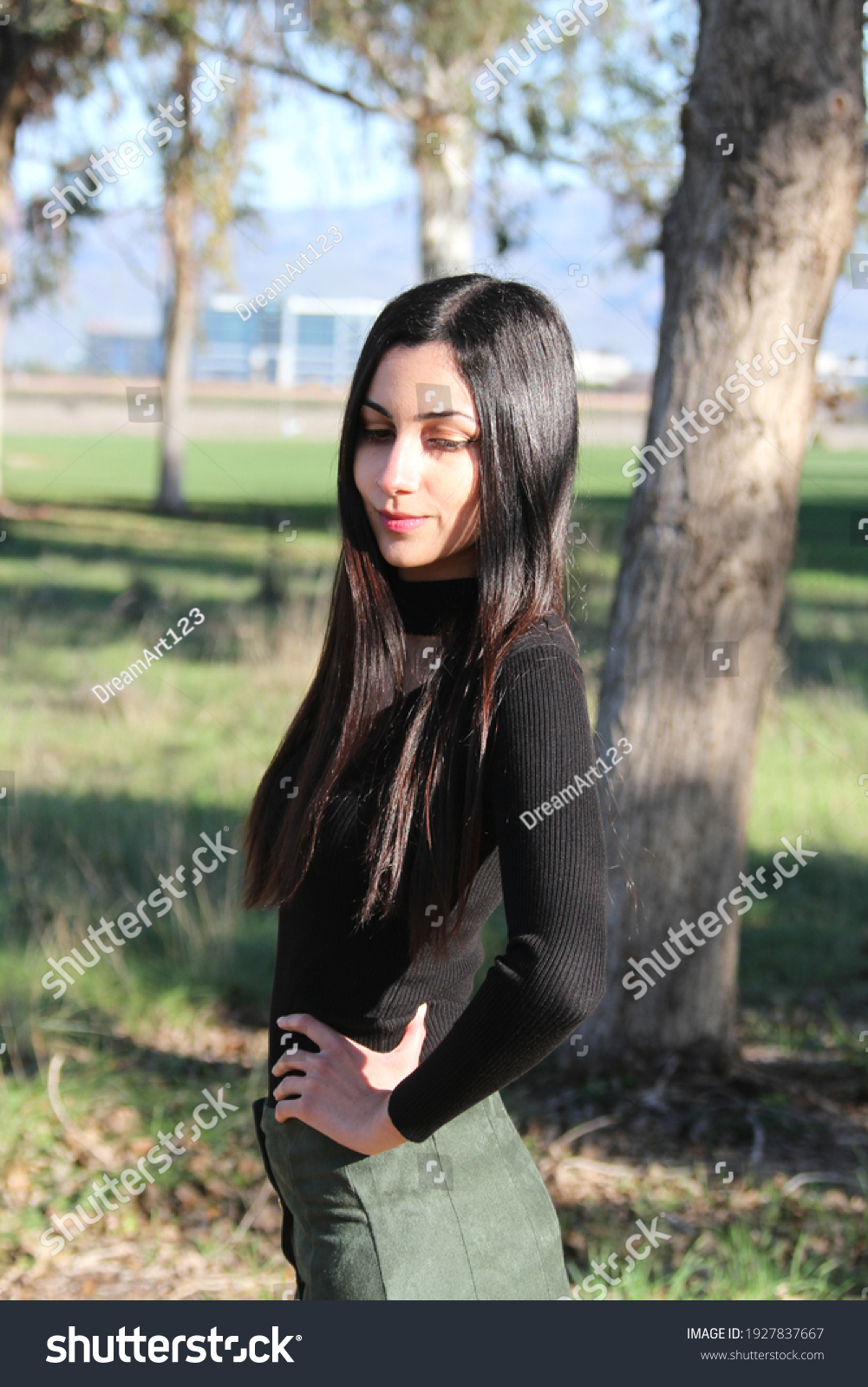 Middle Eastern girl in a park #1927837667