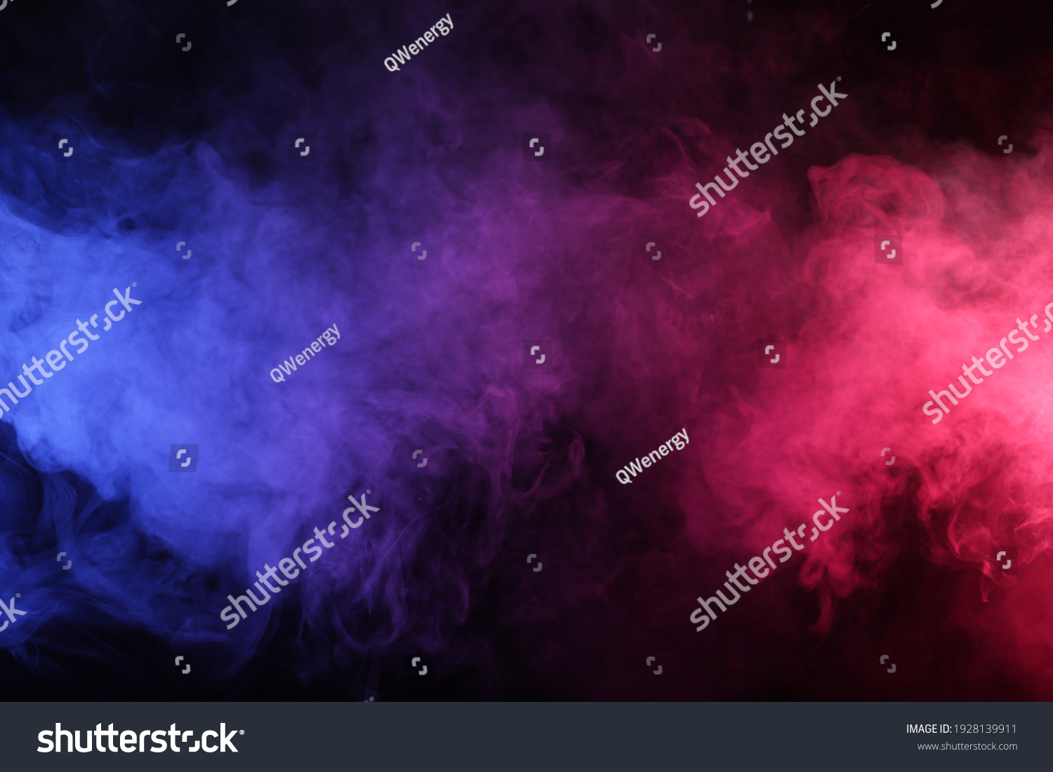 Artificial smoke in red-blue light on black background in darkness #1928139911