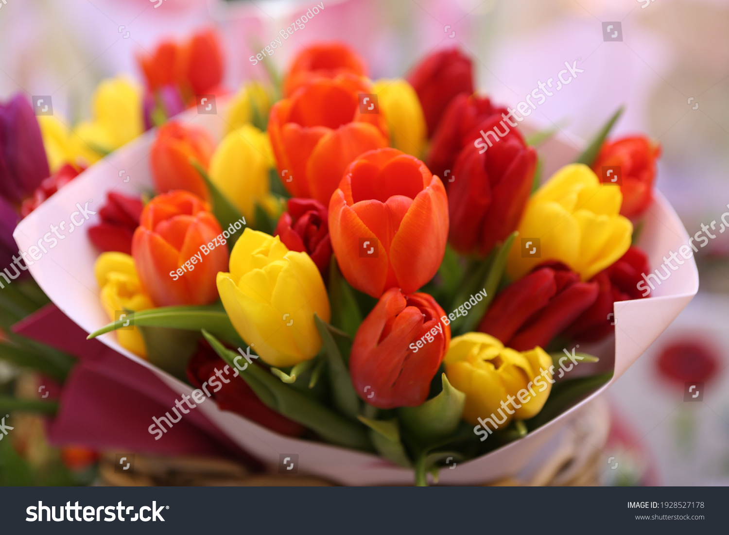 Tulip, tulips bouquet. Present for March 8, International Women's Day. Holiday decor with flowers. Bouquet with colorful tulips. Red tulip, yellow tulip. Holiday floral decor. Spring tulips, bouquet #1928527178