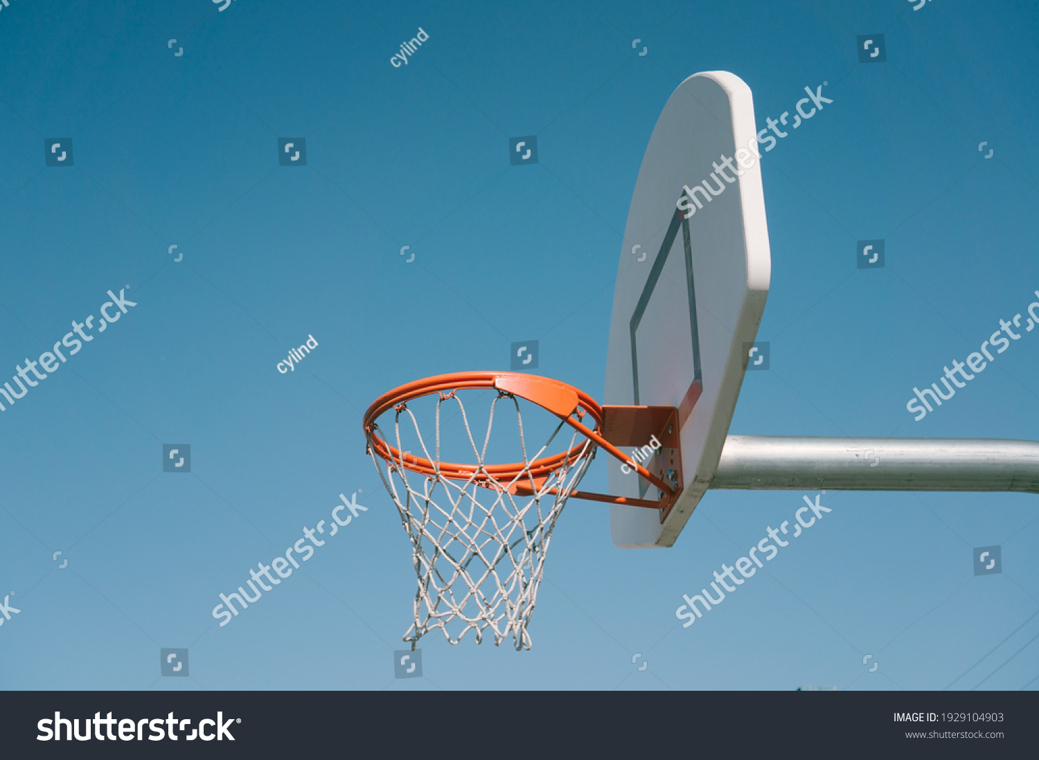 Playing basketball during the day #1929104903