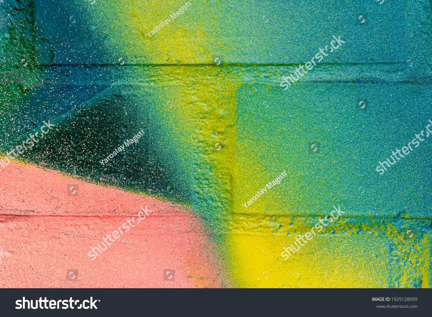 Art under ground. Beautiful street art graffiti background. The brick wall is decorated with abstract drawings house paint. Modern style urban culture of street youth. Abstract picture on wall #1929128099