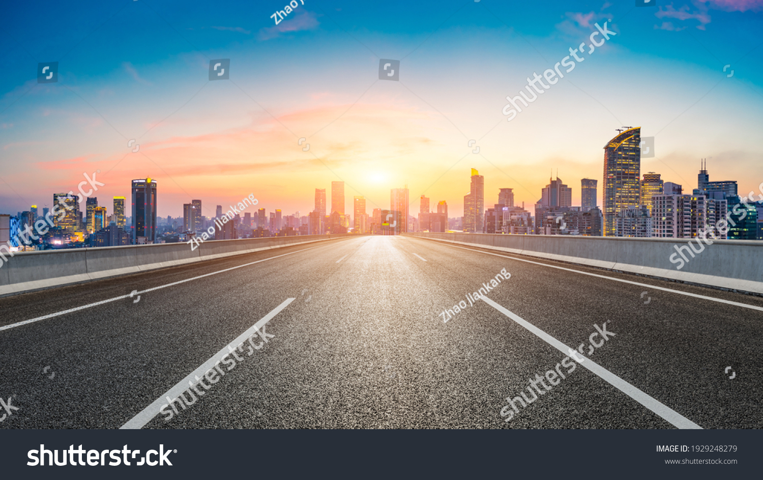 Empty asphalt road and city skyline with buildings at sunset in Shanghai. #1929248279