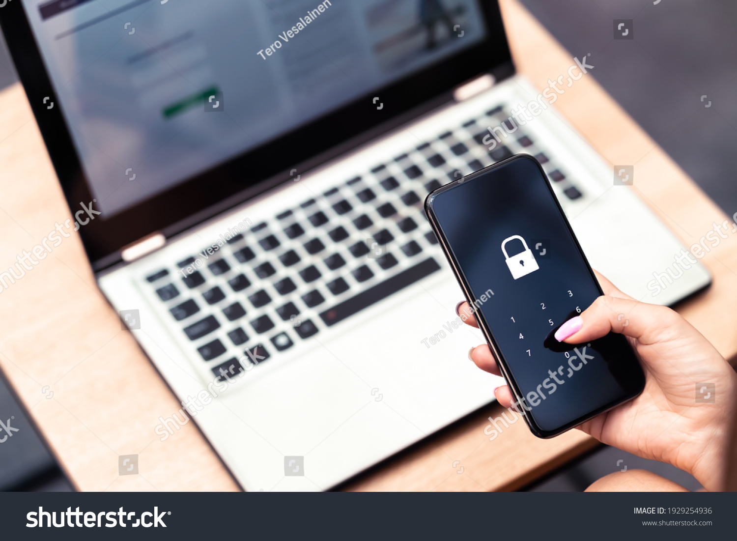 Phone password lock for mobile cyber security or login verification passcode in online bank app. Data privacy and protection from hacker, identity thief or cybersecurity threat. Laptop and smartphone. #1929254936