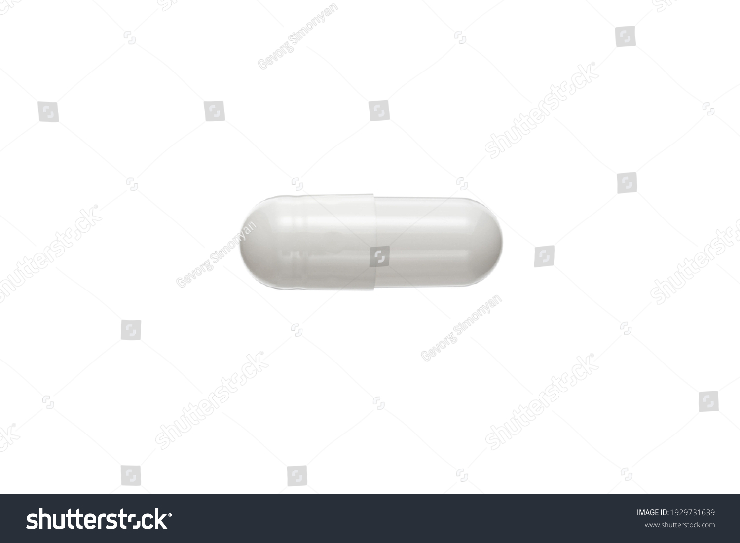 Tablet in capsule. Capsule pill on white background #1929731639
