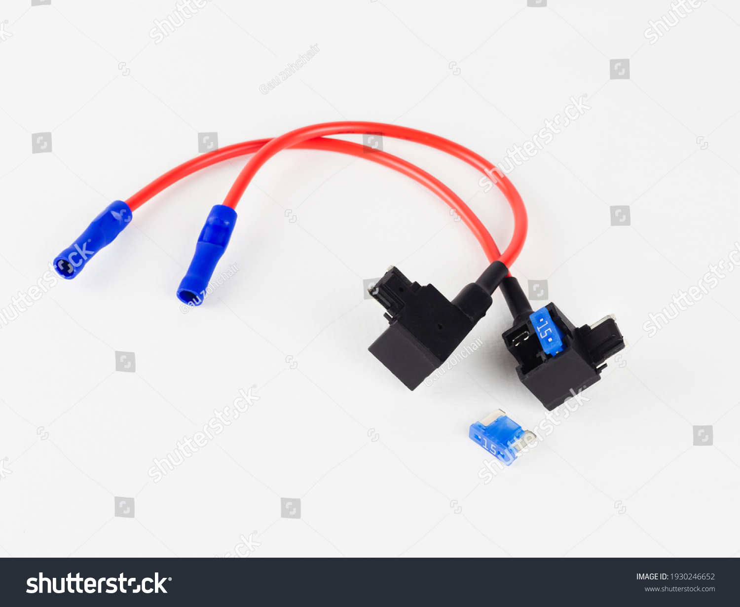 Two micro fuse tap, one has one fuse inserted and a spare fuse placed outside on a white background. #1930246652