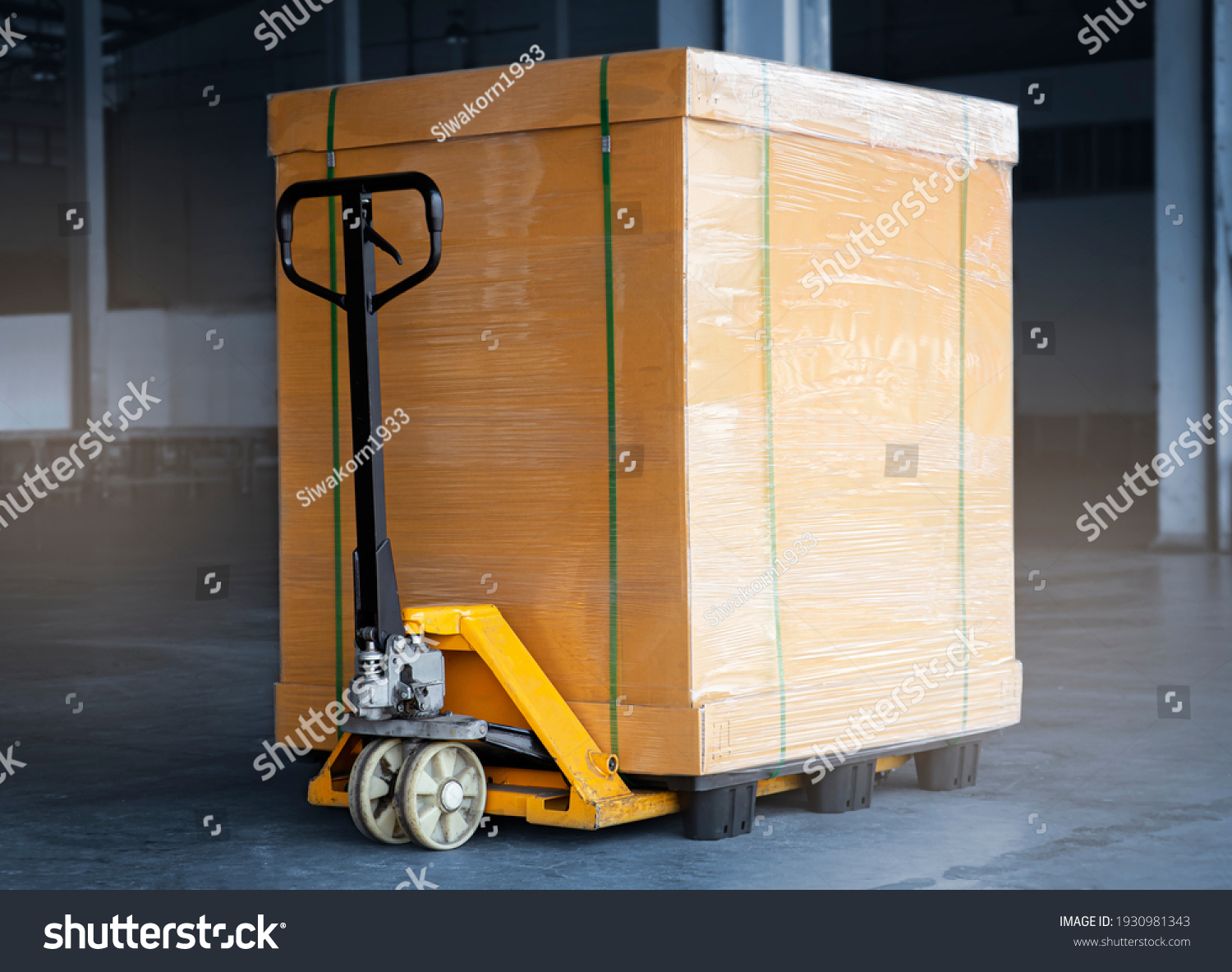 Heavy Package Box Wrapped Plastic Film on Pallet with Hand pallet Truck. Cargo Shipment. Shipping Warehouse. #1930981343