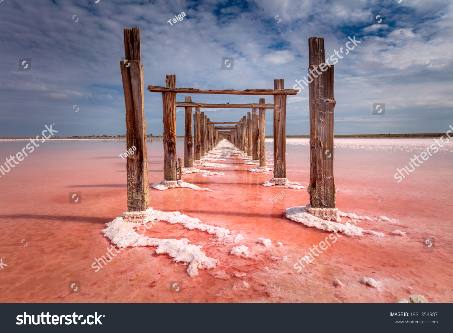 Minimalistic natural landscape Real pink color of salt lake and deep blue sky, Ukraine travel background. Miracle of nature #1931354987