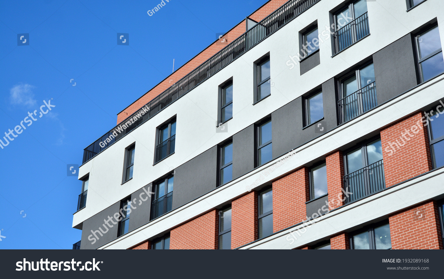 Cityscape with facade of a modern residential building. Modern European residential apartment building. #1932089168