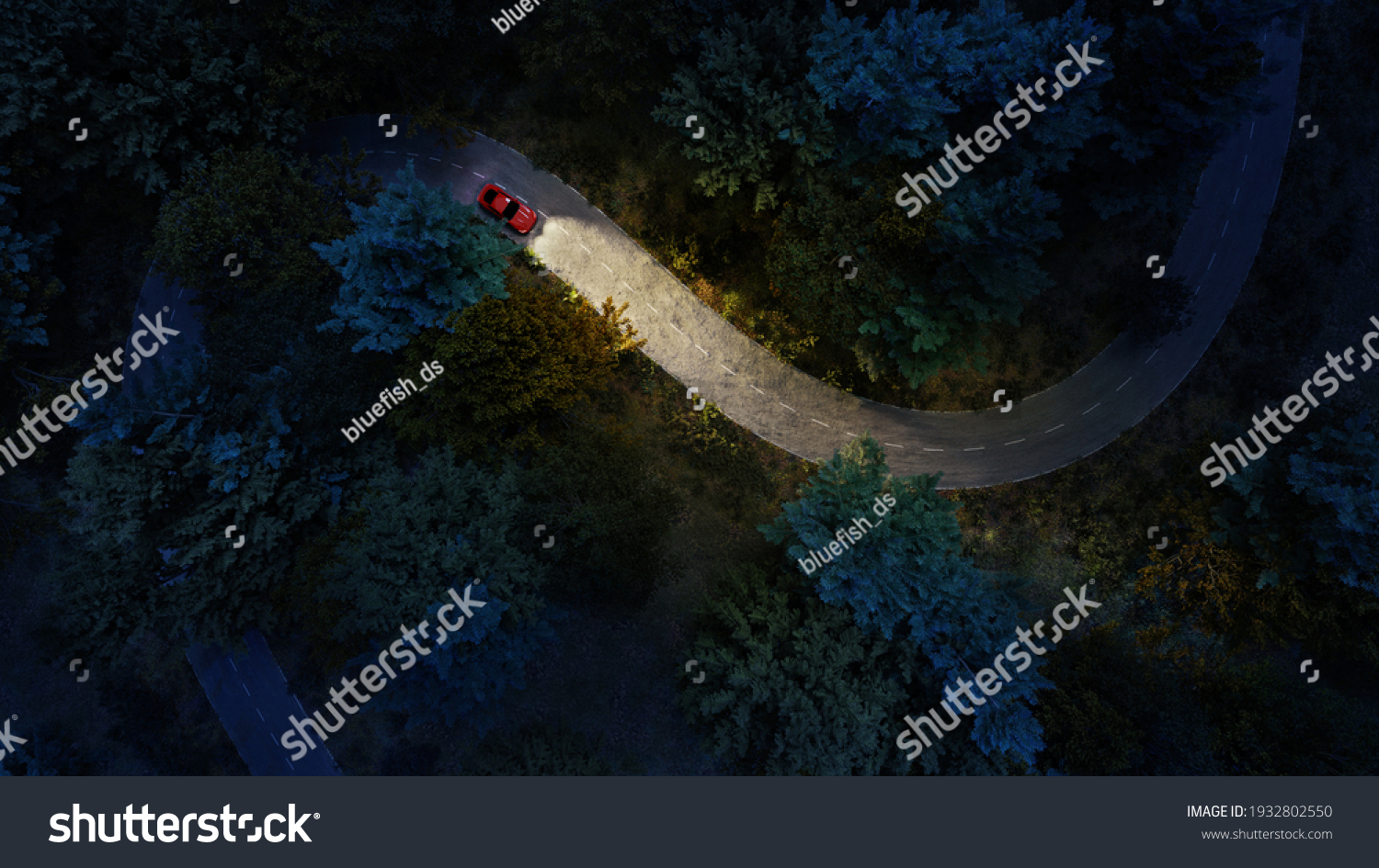 Adventure night road trip in the forest, aerial view of a car headlights on deep jungle road. On The Road Again concept. #1932802550