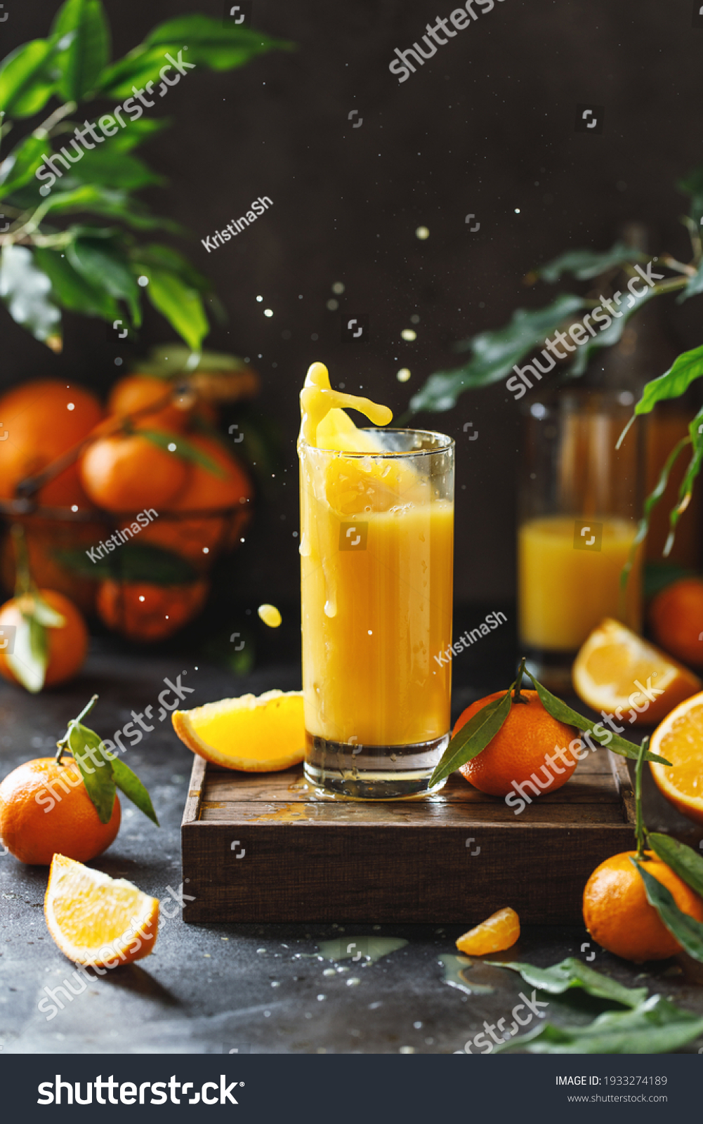 A glass of orange juice. Orange juice splash #1933274189