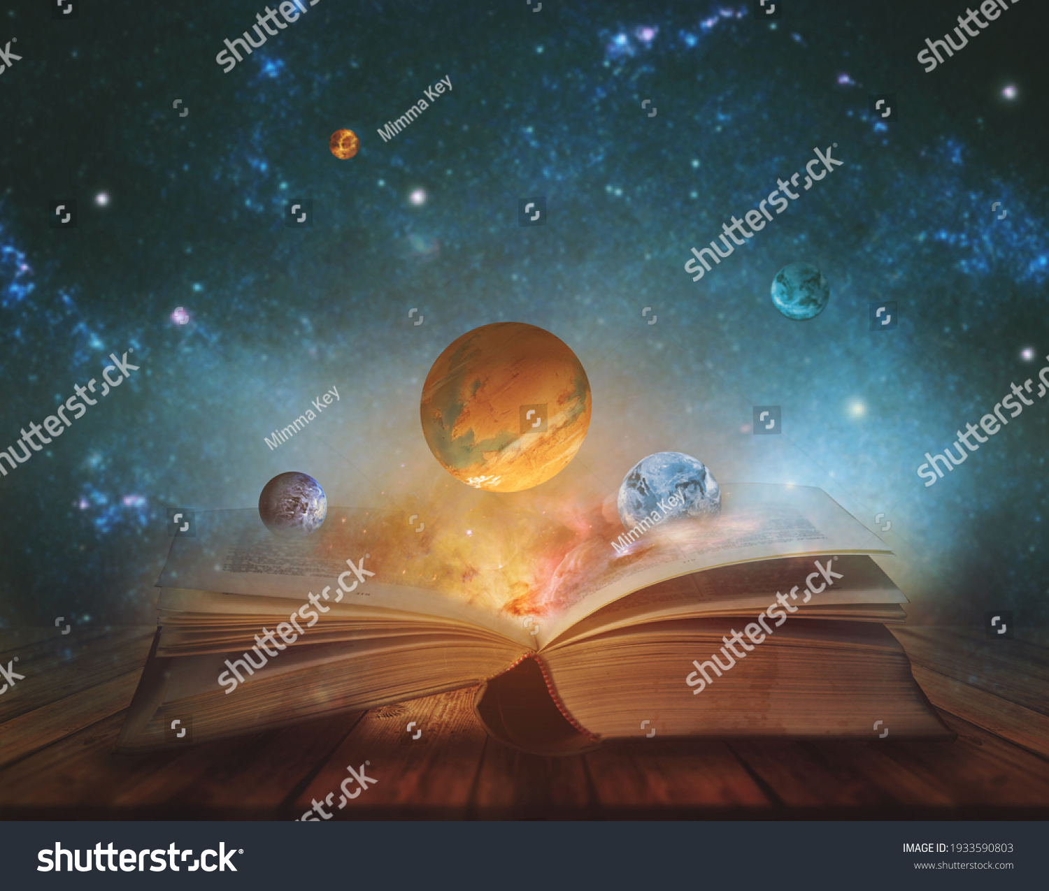 Book of the universe - opened magic book with planets and galaxies. Elements of this image furnished by NASA #1933590803