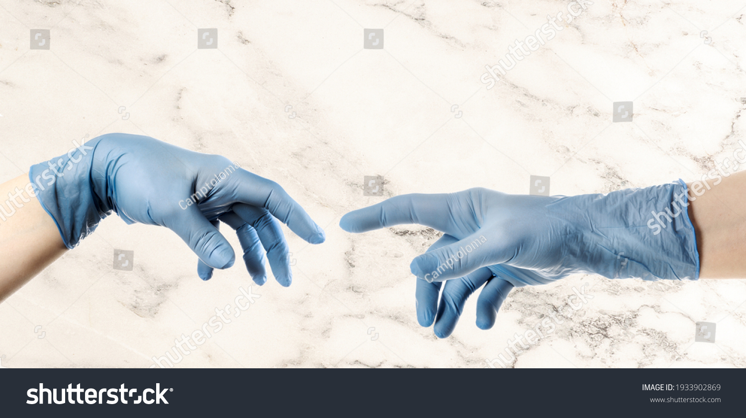 Hands with blue glove based on Michelangelo s painting of God creating man The Creation of Adam #1933902869