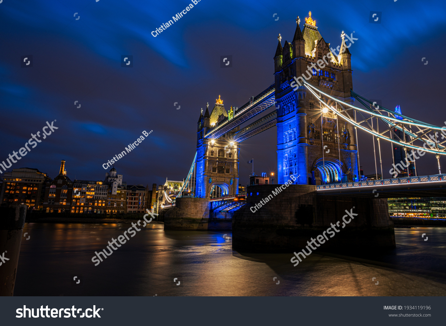 Towers of London, historical bridge of England illuminated in evening lights in London - UK #1934119196