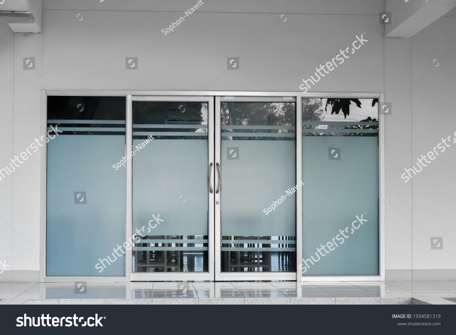 Front doors, glass doors, aluminium door of the store and the office. #1934581319