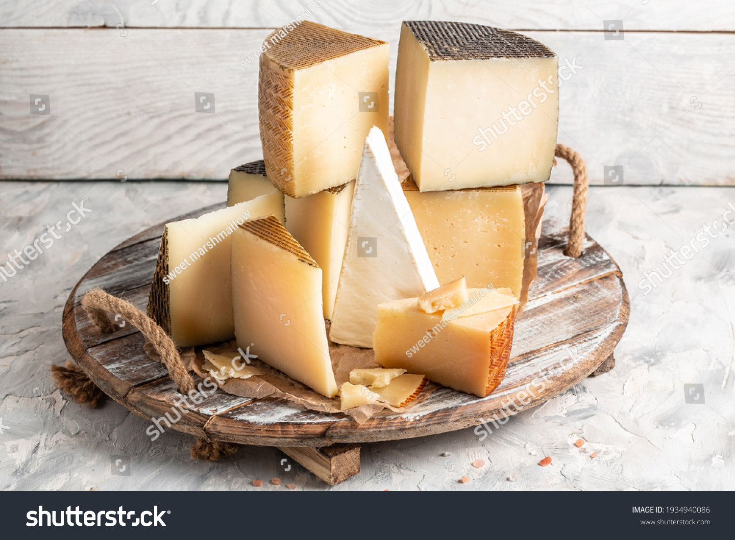 Petit Basque, French cheese, Cheese board of various types of soft and hard cheese. spanish manchego cheese. #1934940086
