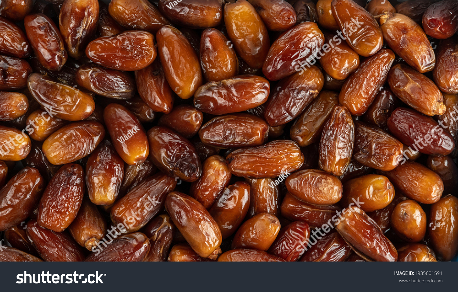 The surface texture of selected dried dates. Natural oriental sweets. #1935601591