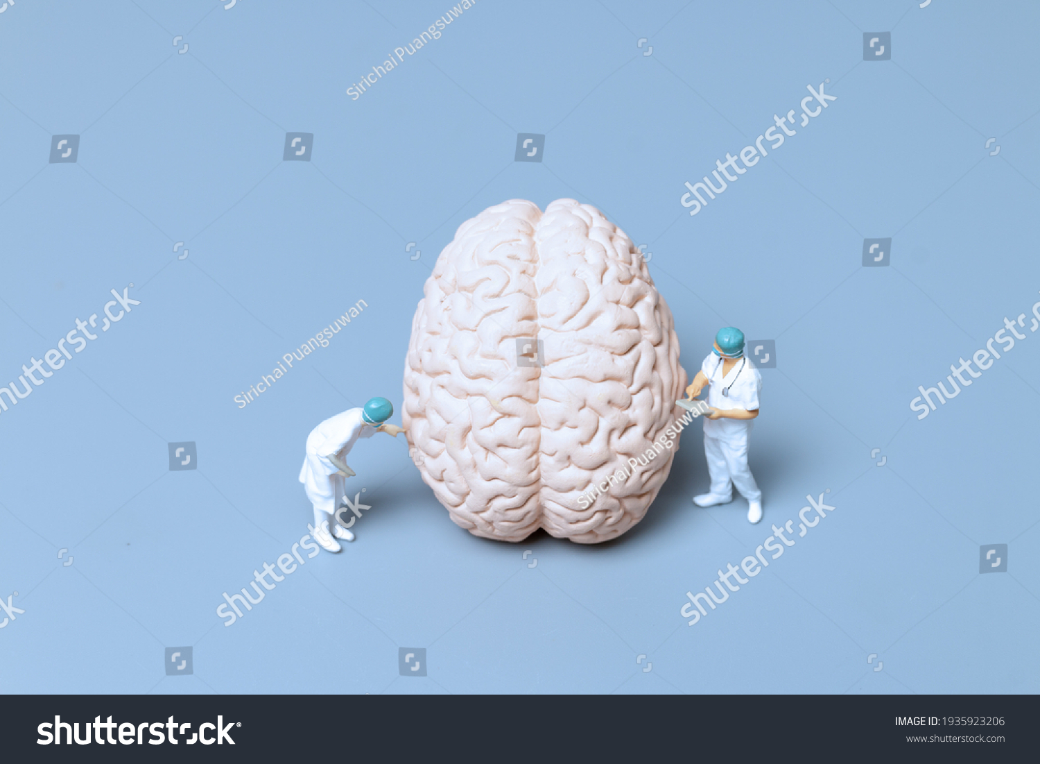 Miniature Doctor checking and analysis alzheimer's disease and dementia of brain, Science and medicine concept #1935923206