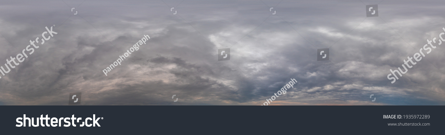 Sky panorama on overcast rainy day with low clouds in seamless spherical equirectangular format. Complete zenith for use in 3D graphics, game and for aerial drone 360 degree panorama as a sky dome. #1935972289