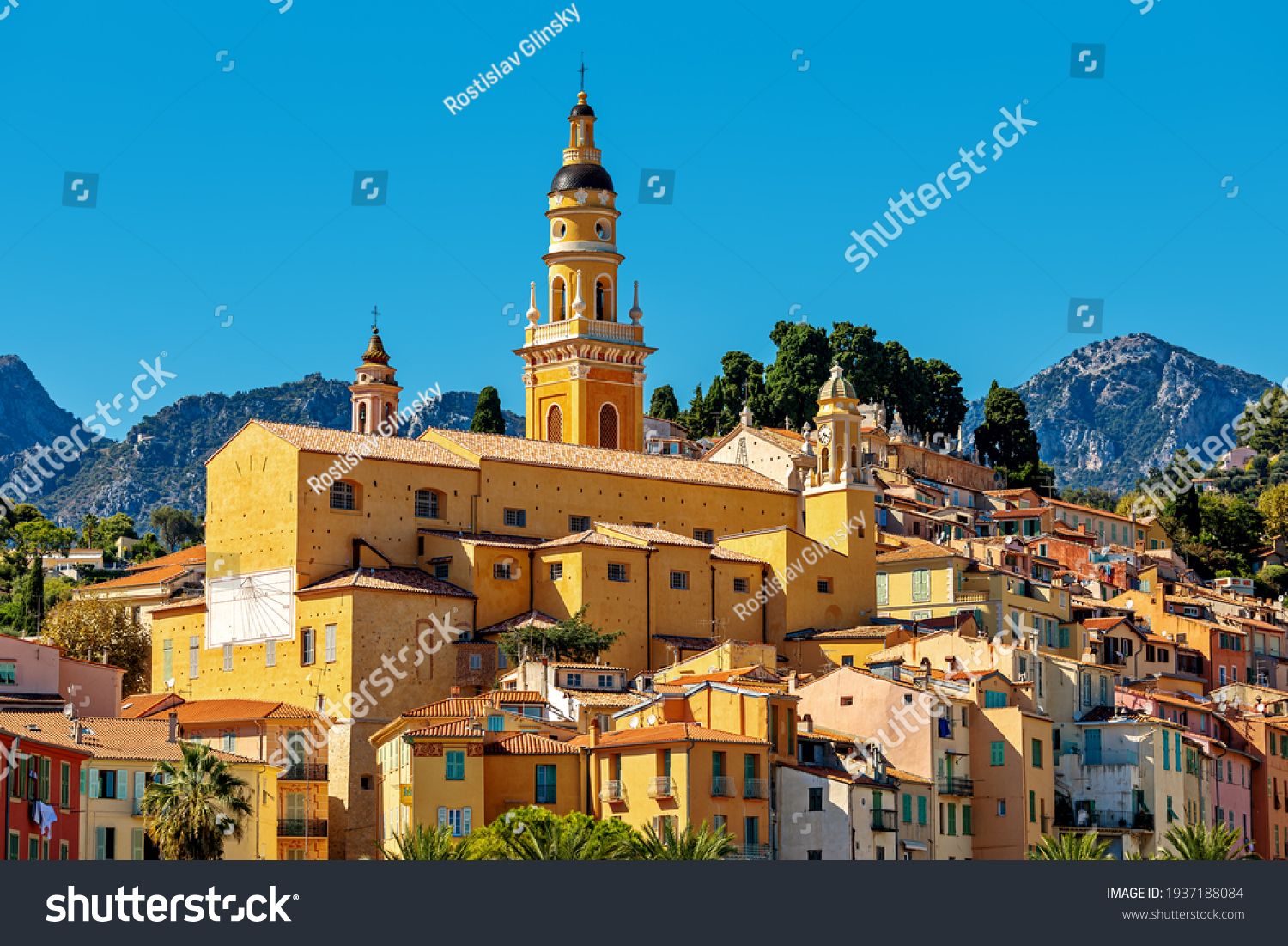 View of colorful houses and belfry of the Saint Michel Archange basilica in old town of Menton - small town on French Riviera. #1937188084