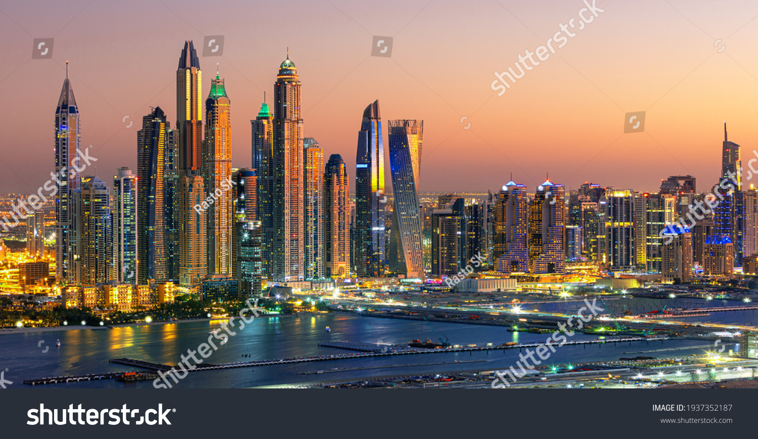 Aerial view on Dubai Marina with skyline - luxury and famous Jumeirah beach frontline at sunrise, United Arab Emirates #1937352187
