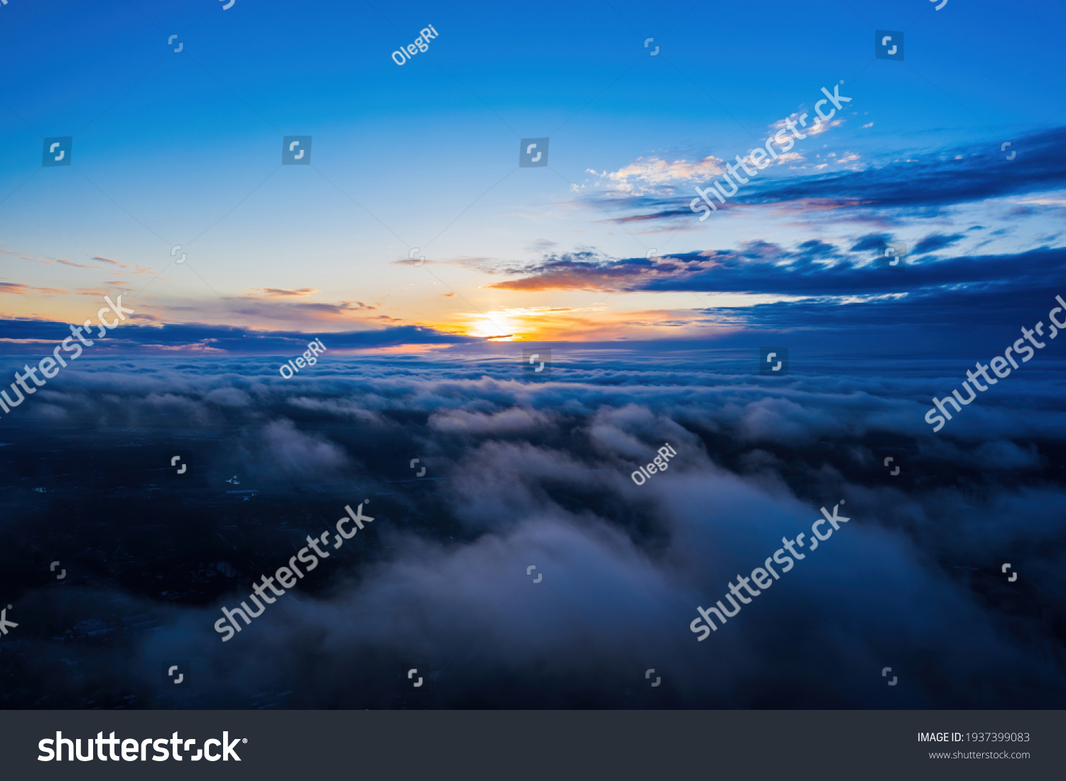 Sunset on blue sky. Blue sky with some clouds. blue sky clouds, summer skies, cloudy blue sky #1937399083