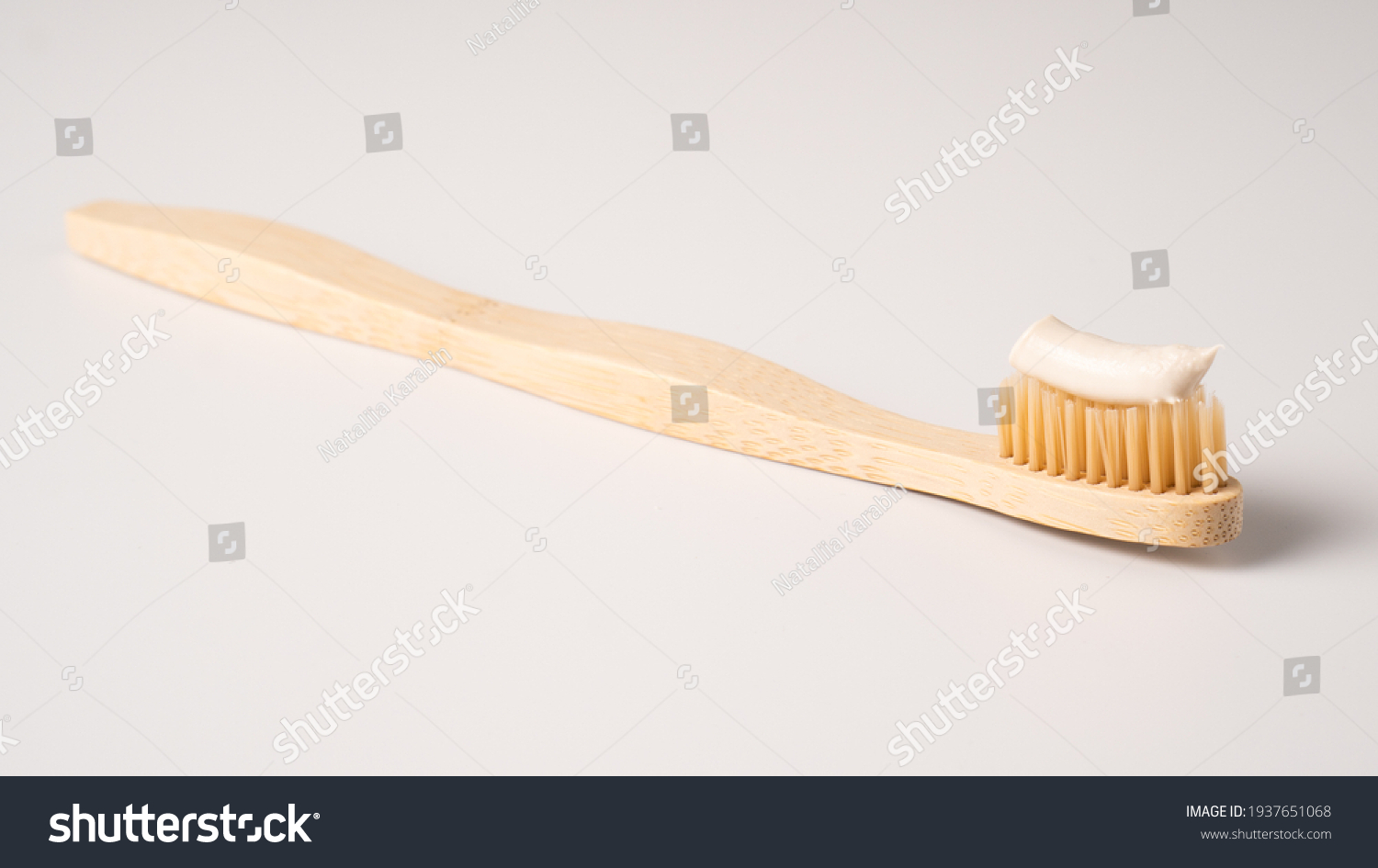 Bamboo toothbrush isolated on a white background. Eco dental concept. Zero waste #1937651068