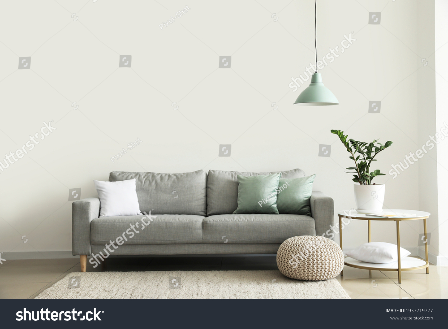 Interior of modern room with comfortable sofa #1937719777