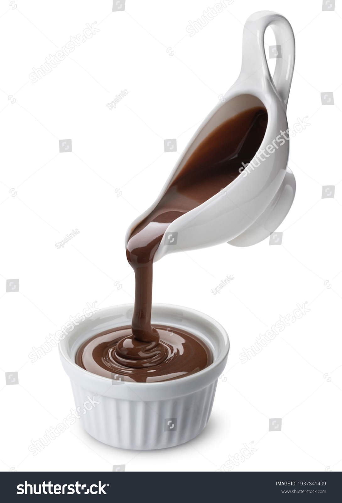 Pouring melted chocolate isolated on white background with clipping path #1937841409