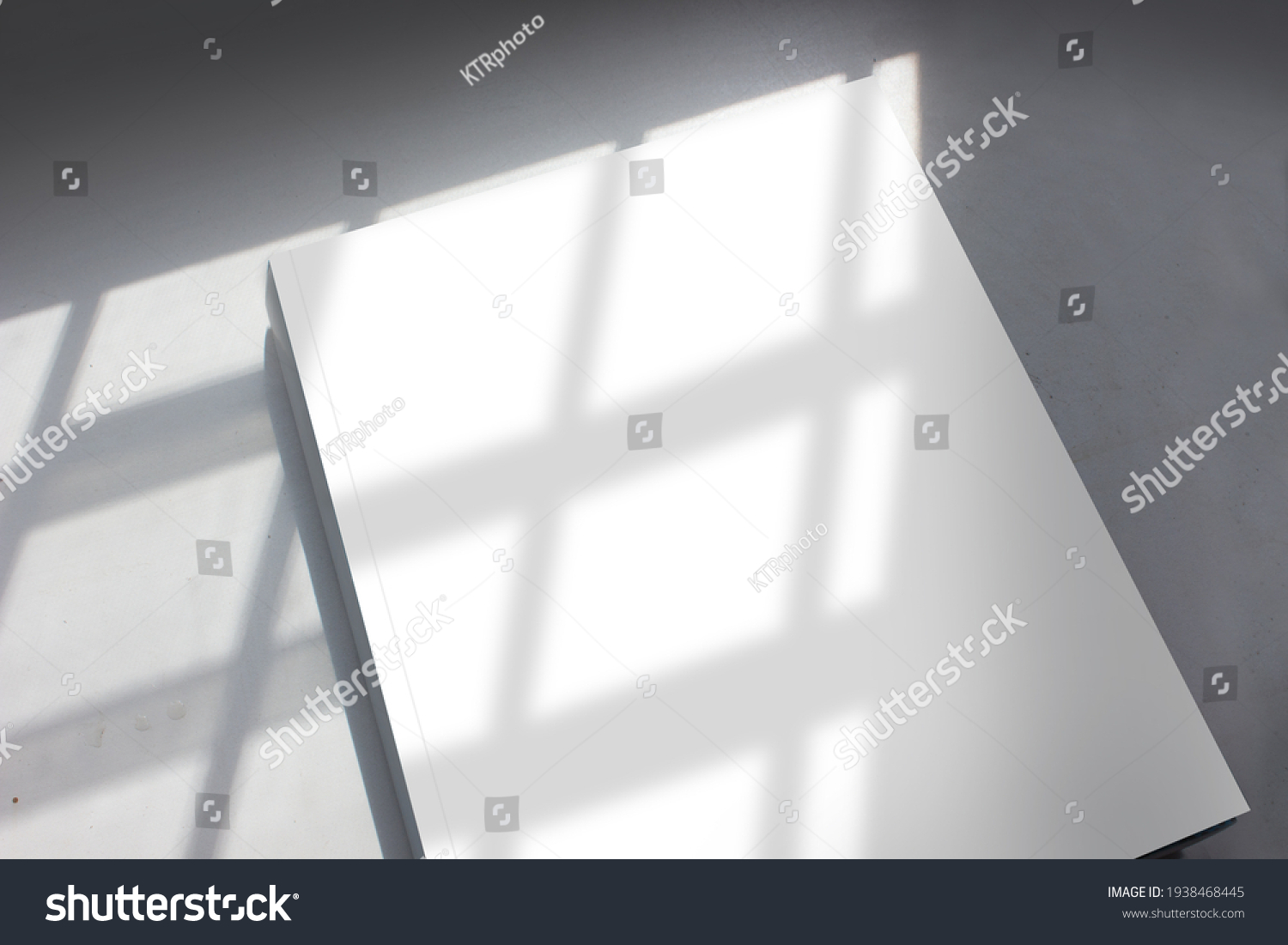 Blank cover page of the thick textbook in stripe pattern shadow from daylight for modern arts, design, or architecture publishing advertising mockup. #1938468445