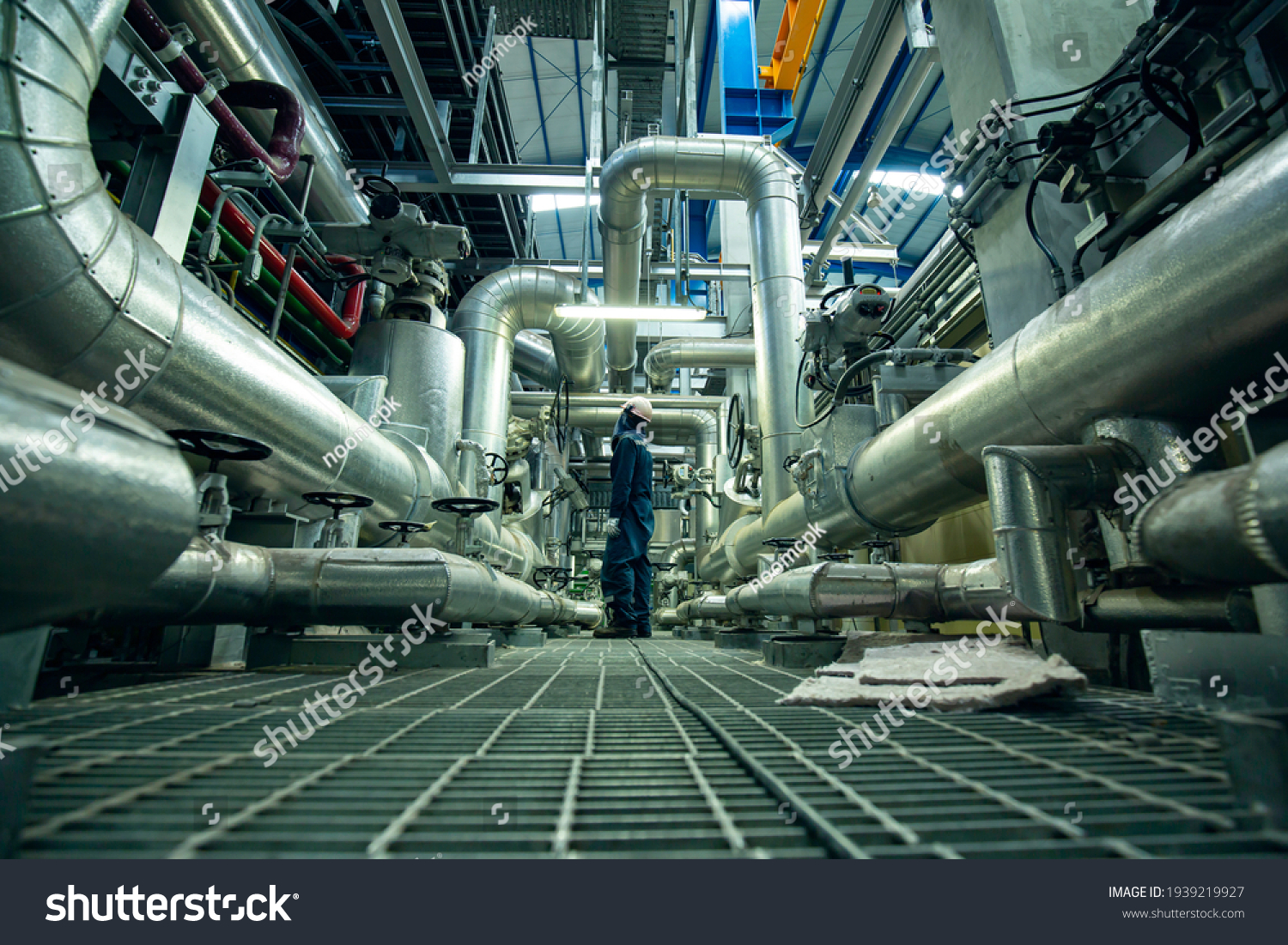 Male to be worker visual inspection inside control room valve and pipeline power plants #1939219927
