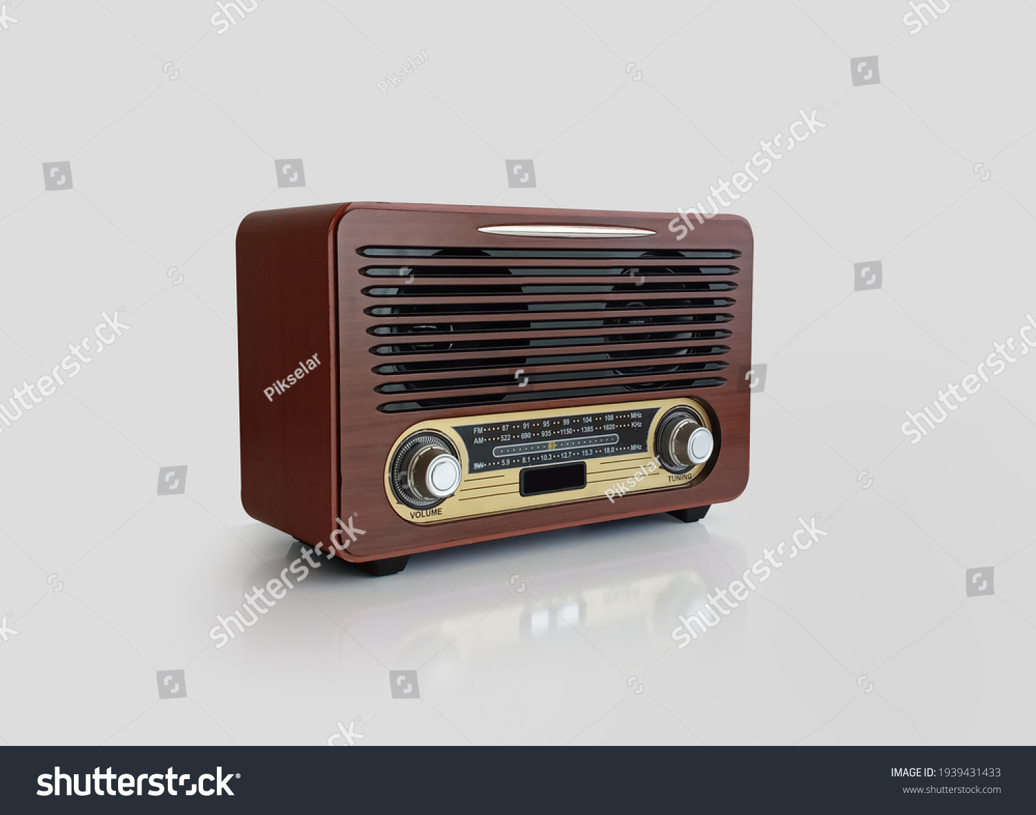 Old brown radio, retro radio without background. Perspective vintage radio isolated. #1939431433
